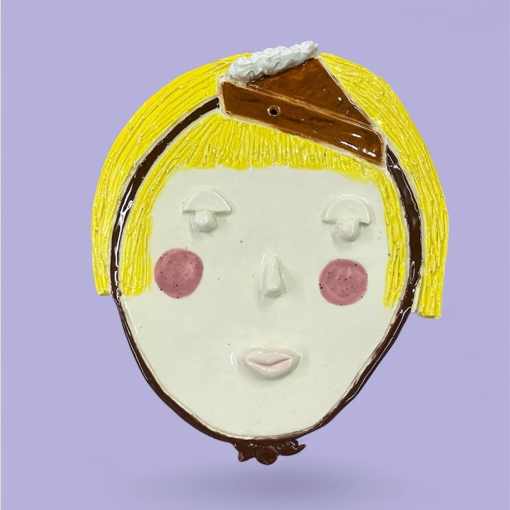 “Pie Beret Blondie” Girl Yellow and Brown Ceramic Face Wall Art